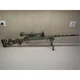 Camo Form Woodland utilisé pour camoufler une carabine (Airsoft)