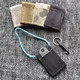 Micro-pochette SERE (livrée nu, sans accessoire ni cordelette)